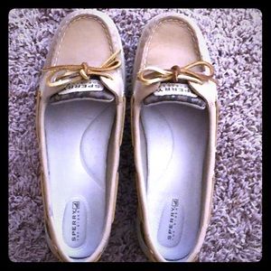 Tan Sperry’s with cheetah print and gold laces.